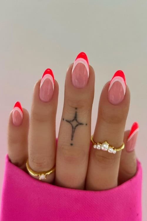 Neon French tips on oval nails