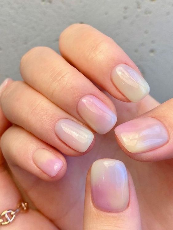 Soft pastel ombré nails, offering a serene and calming aesthetic for spring.