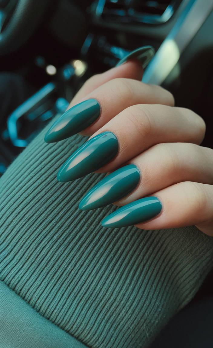 Deep forest green nails, sleek and bold.