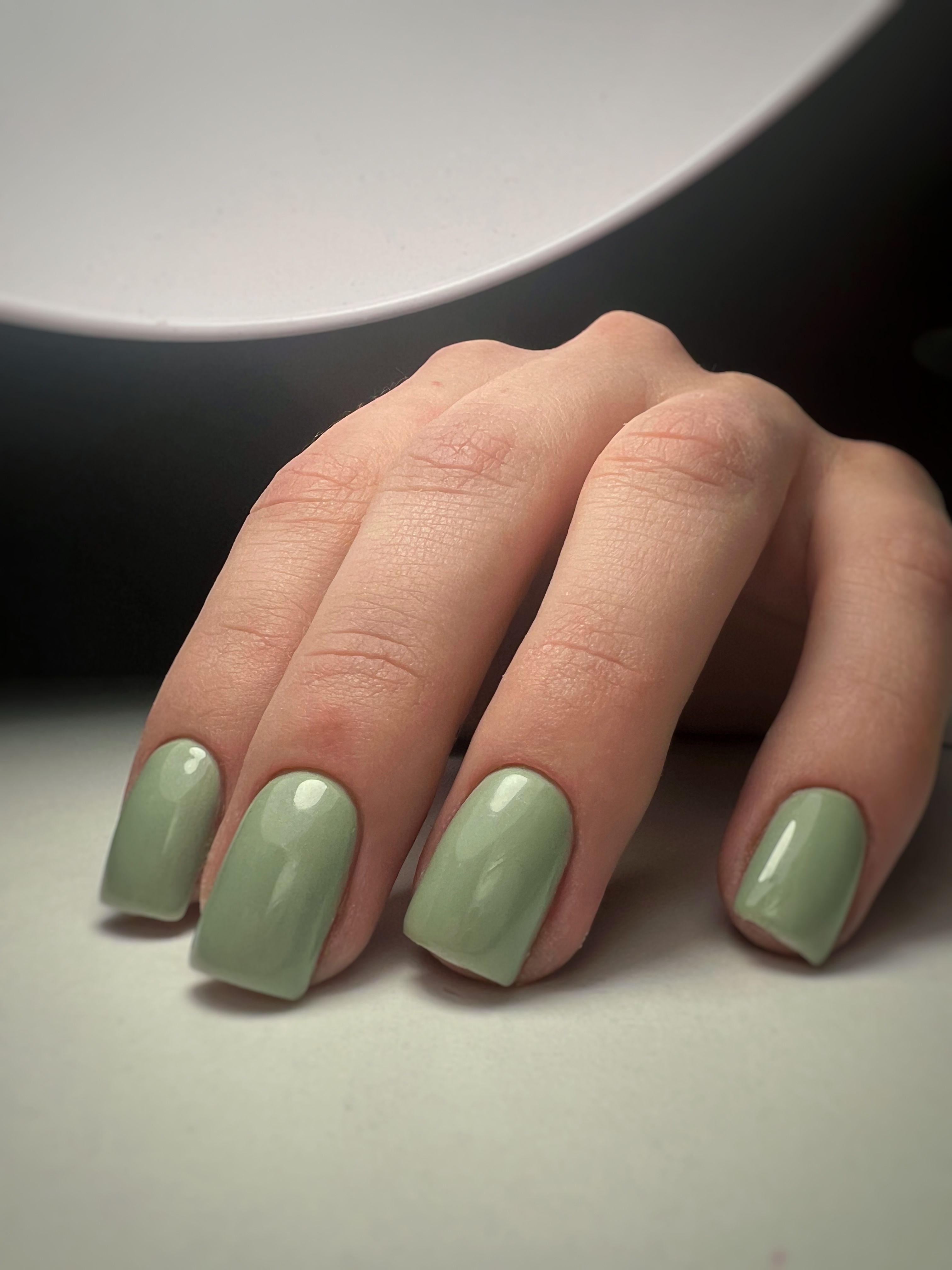 Soft sage green nails, spring nail color trends, elegant manicure