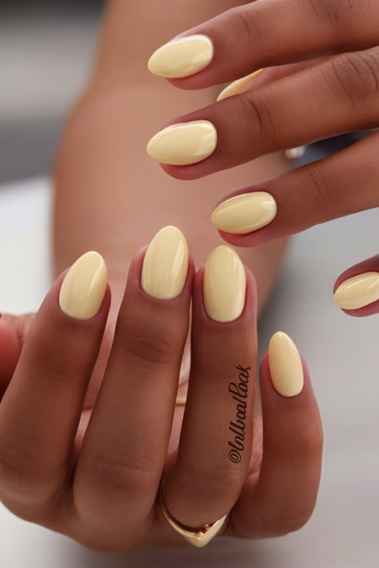 Solid yellow oval nails, simple spring nails, cheerful manicure