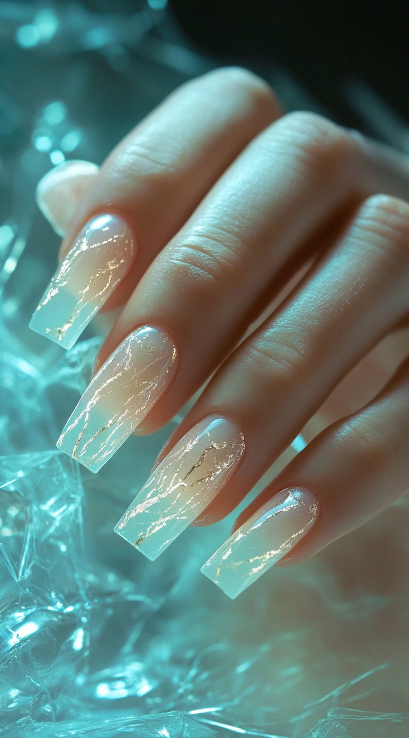 Long square nails with translucent marble effect.