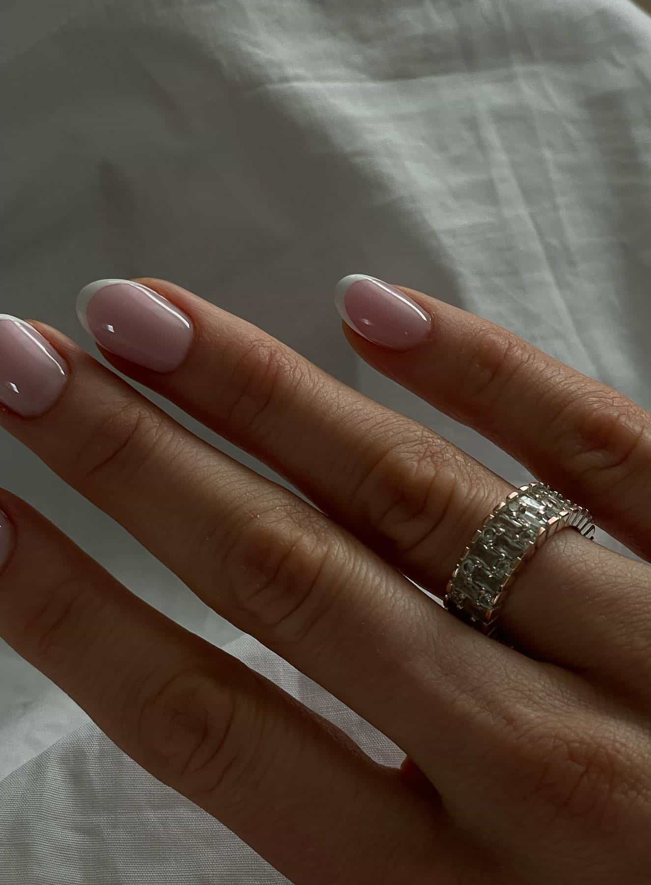 Almond nails with modern French tip.