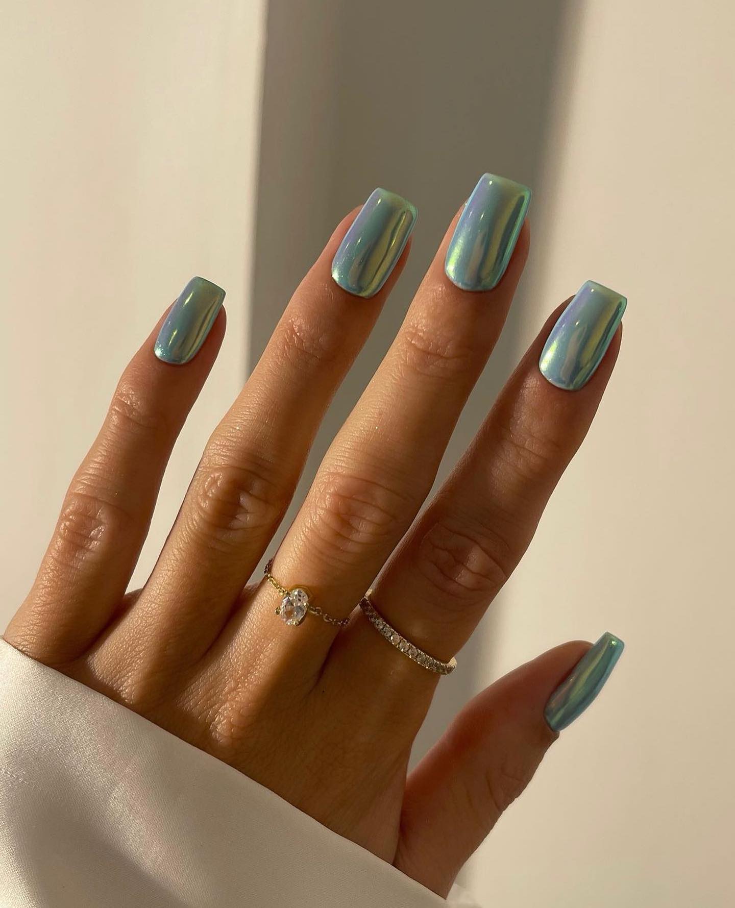 Medium square nails with holographic shimmer.