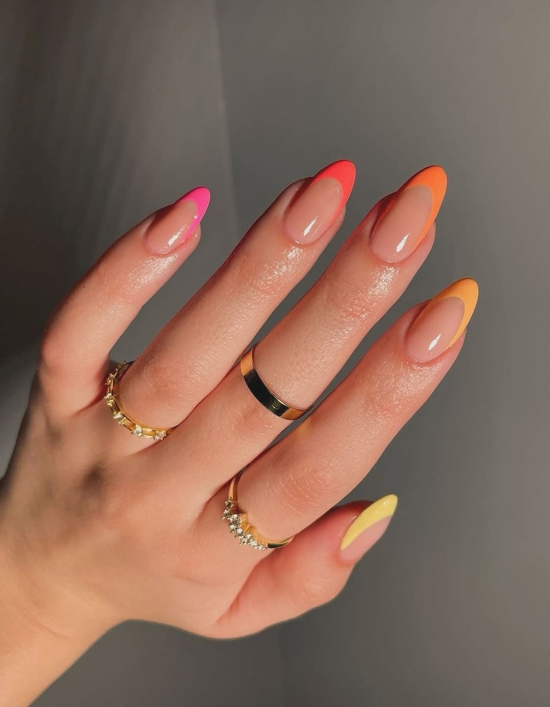 Gradient flame nails in warm tones, perfect for bold vacation styles and dramatic effects