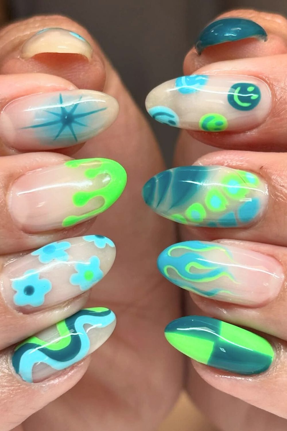 Colorful psychedelic pattern nails, perfect for bold vacation styles and creative expression
