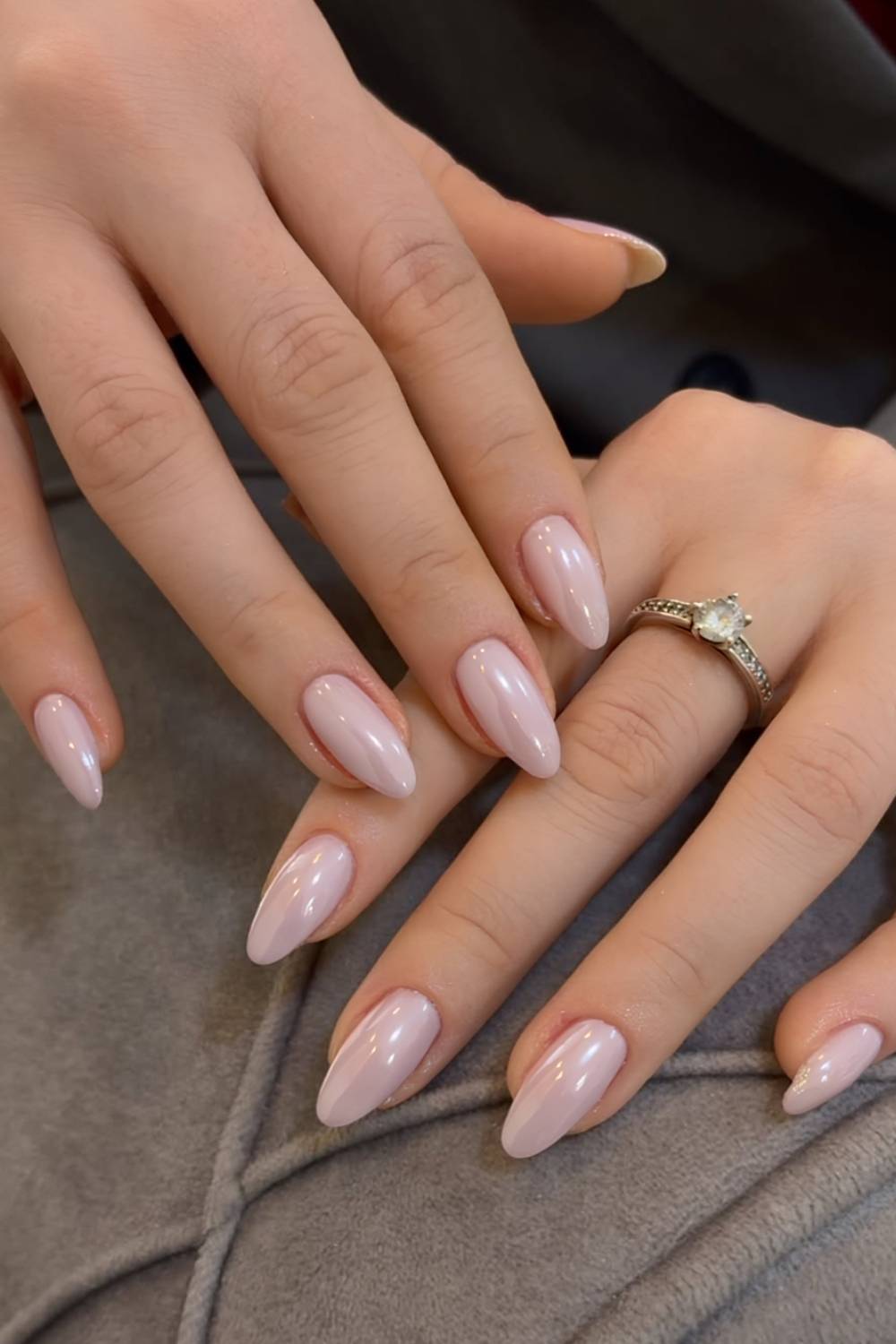 Almond-shaped nails in classic nude, timeless and elegant.