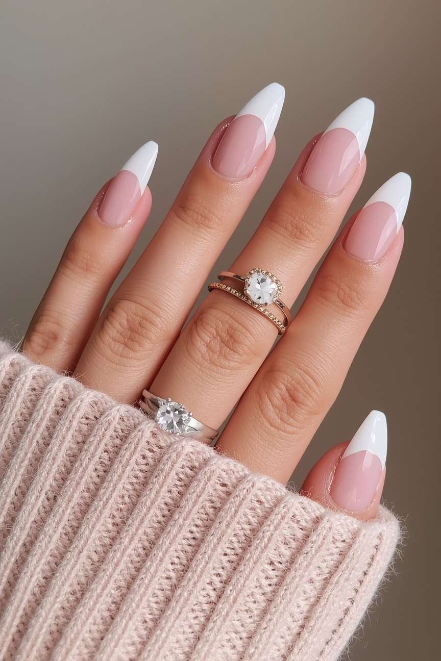 Coffin-shaped French manicure, bold bridal style.