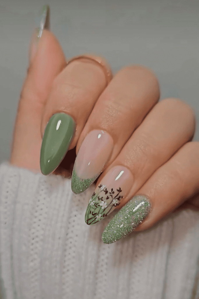 Green and floral accent nails, earthy almond nails.