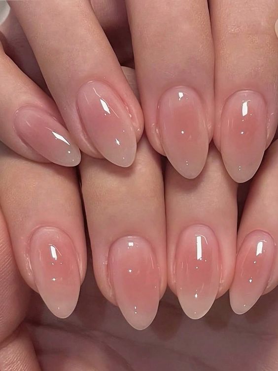 Glazed nude almond nails, simple and elegant.